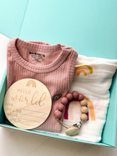Load image into Gallery viewer, Organic pink baby girl gift box with romper, swaddle, and dummy chain