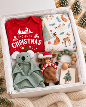 Load image into Gallery viewer, Open newborn Christmas hamper with festive baby essentials and a mini Christmas card