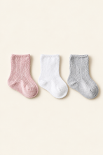 Load image into Gallery viewer, Babynor ribbed organic baby socks in blush, white and grey on a warm ivory background