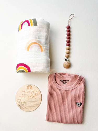 Eco-friendly newborn gift set for girls with rainbow muslin and wooden sign