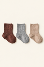 Load image into Gallery viewer, Babynor ribbed organic baby socks in rust, grey and oat on a warm ivory background
