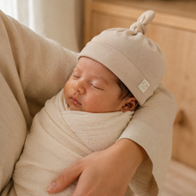 Load image into Gallery viewer, Organic Knot Hat - Beige, lifestyle image
